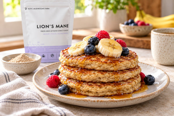 Lion's Mane pancakes stacked with banana and berries