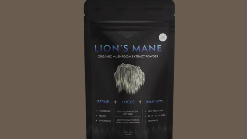Lion’s Mane organic mushroom extract powder in black resealable pouch packaging, highlighting supplement branding and product label.
